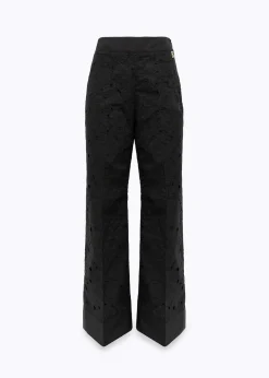 FLARED PANTS WITH CUT-OUT ROSE DESIGN