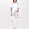 GABARDINE PANTS WITH CUT-OUT ROSE DESIGN