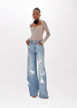 Jeans in denim with rhinestones