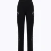 KNITTED PANTS WITH ROSES IN TULLE
