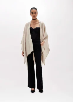 KNITTED PONCHO WITH ALL-OVER LOGO