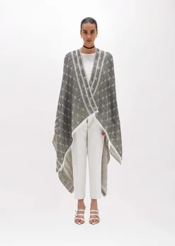 KNITTED PONCHO WITH LOGO