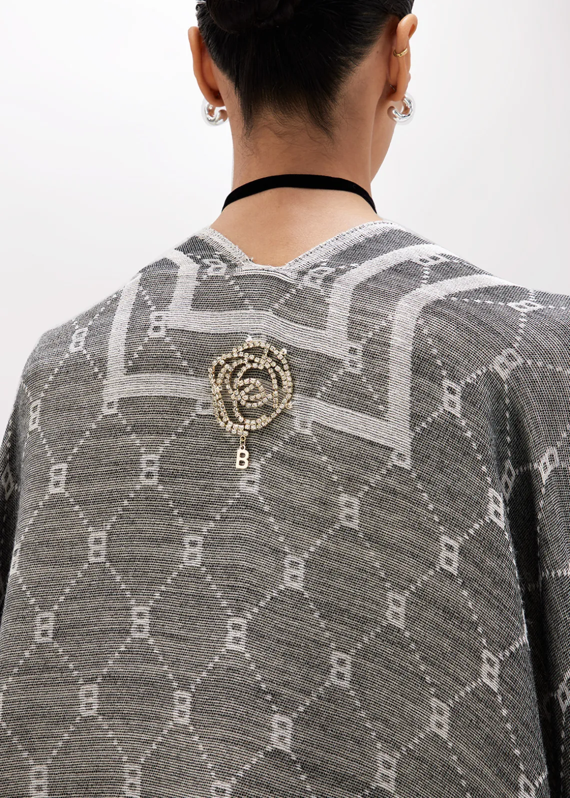 KNITTED PONCHO WITH LOGO