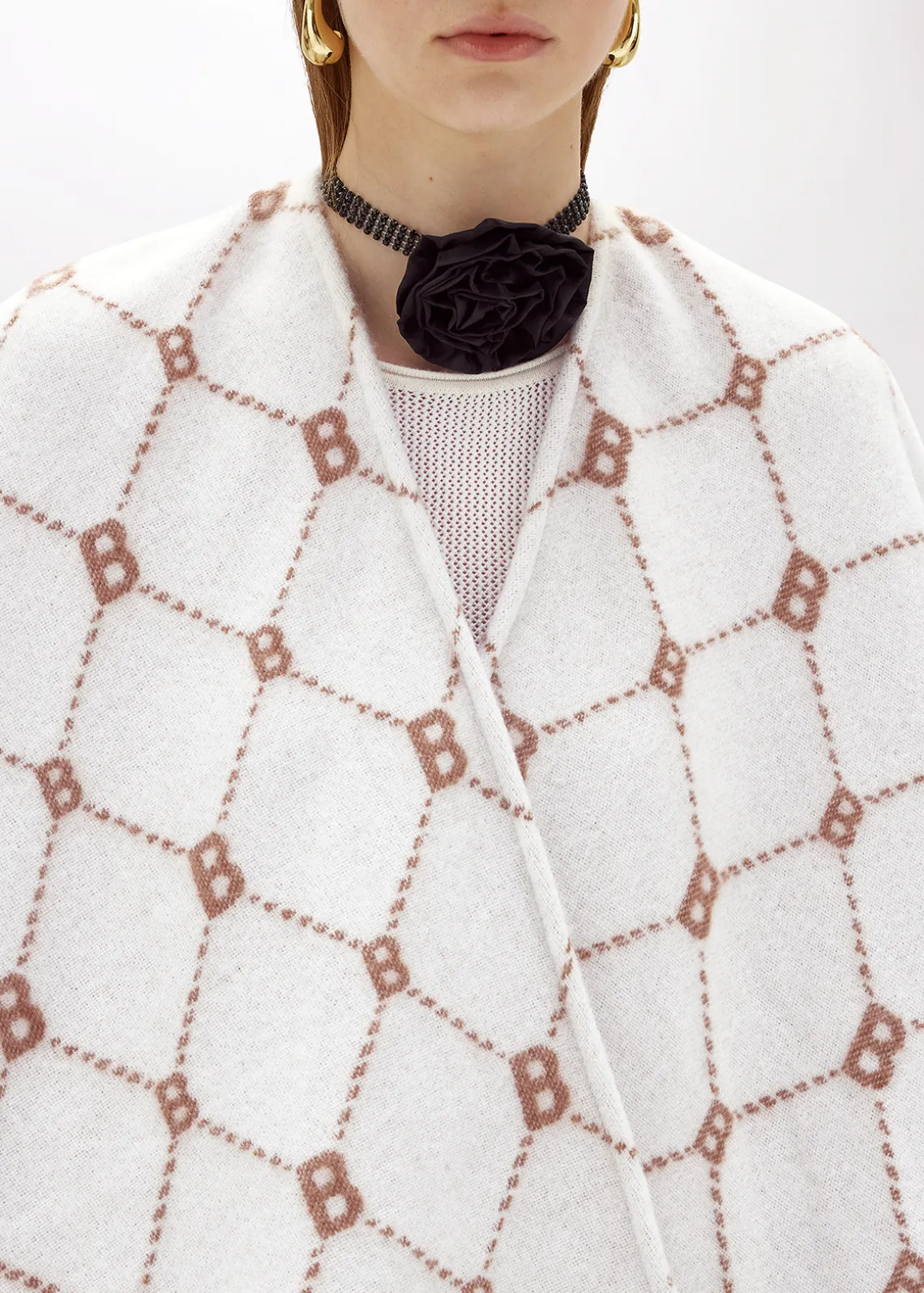 PONCHO WITH ALL-OVER LOGO
