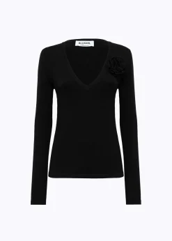 STRIPED SWEATER WITH ROSE BROOCH