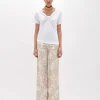 T-SHIRT WITH DRAPED DETAILS AND NECKLACE